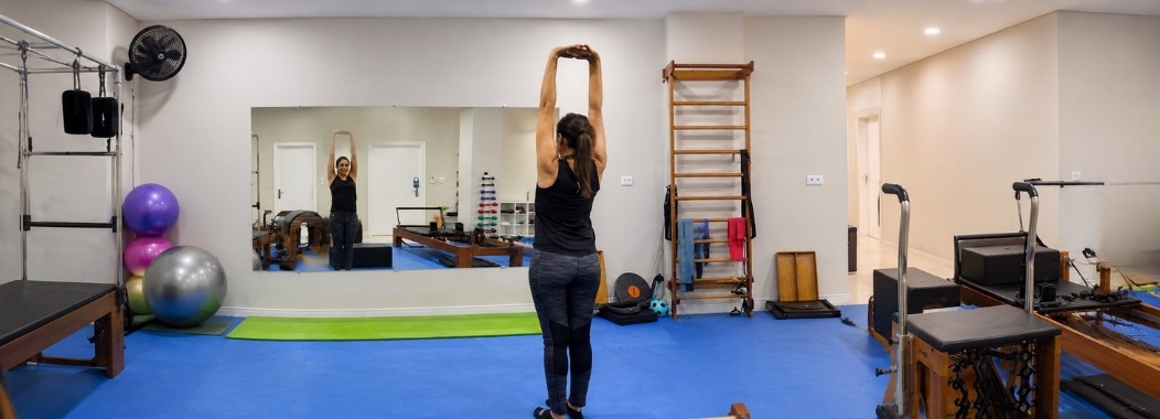 Aluna fazendo Pilates na KT Fisio